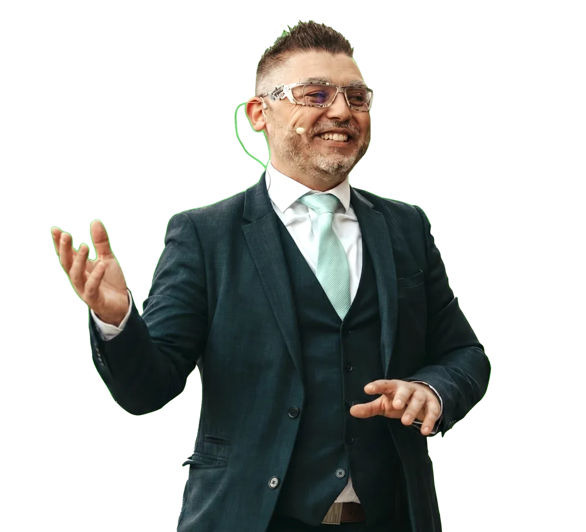 Calix, conférencier B2B inspirant et mentaliste, en costume sur scène, posture ouverte caractéristique de la captation d'attention